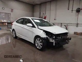 2014 Hyundai Accent GLS z VIN KMHCU4AE4EU756106, wystawiony jako IAAI lot #42027682 z przebiegiem 103 464 mil mil oraz . Historia ofert i sprzedaży dostępna na DreamBid. Obrazek 1.