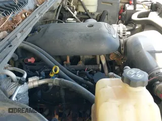 2001 Chevrolet Silverado 2500HD LS z VIN 1GCHK29UX1E313785, wystawiony jako IAAI lot #43371352 z przebiegiem 303 247 mil mil oraz . Historia ofert i sprzedaży dostępna na DreamBid. Obrazek 12.