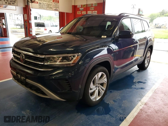 2023 Volkswagen Atlas SE z VIN 1V2HR2CA5PC527628, wystawiony jako IAAI lot #42569146 z przebiegiem 27 424 mil mil oraz . Historia ofert i sprzedaży dostępna na DreamBid. Obrazek 26.
