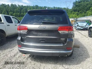 2014 Jeep Grand Cherokee Summit with VIN 1C4RJFJT4EC346946, listed as a Copart auction lot 60613025 with 50,565 mi miles and Salvage title. Bid and sale history available at DreamBid. Image 6.