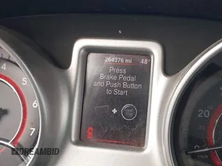 2013 Dodge Journey SE with VIN 3C4PDCAB1DT558033, listed as a IAAI auction lot 41804619 with 204,567 mi miles and . Bid and sale history available at carsss.com. Image 7.