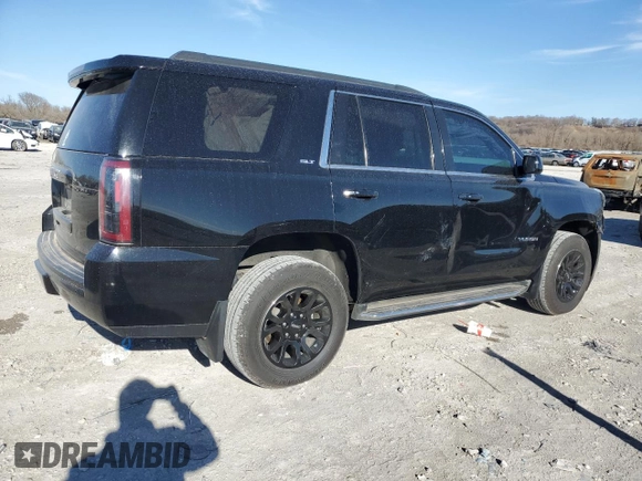 2015 GMC Yukon SLT with VIN 1GKS2BKC6FR508214, listed as a Copart auction lot 48882705 with 182,571 mi miles and Salvage Title. Bid and sale history available at carsss.com. Image 3.