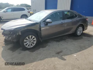 2018 Toyota Camry LE с VIN 4T1B11HK1JU118582, выставлен на аукционе Copart как лот 57972895 с пробегом 39 776 миль миль и Списание • Salvage title. История ставок и продаж доступна на DreamBid. Изображение 1.