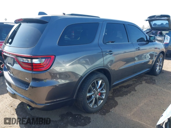 2014 Dodge Durango R/T z VIN 1C4SDJCT5EC591649, wystawiony jako IAAI lot #42346947 z przebiegiem 143 143 mil mil oraz . Historia ofert i sprzedaży dostępna na DreamBid. Obrazek 4.