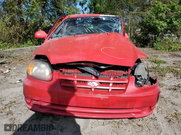 2005 Hyundai Accent GLS with VIN KMHCG45CX5U618473, listed as a Copart auction lot 76752994 with 0 mi miles and Salvage Title. Bid and sale history available at carsss.com. Image 5.