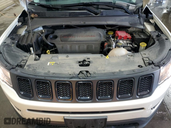 2021 Jeep Compass Latitude z VIN 3C4NJDBB5MT512547, wystawiony jako Copart lot #56885125 z przebiegiem 89 980 mil mil oraz Szkoda całkowita • Salvage title. Historia ofert i sprzedaży dostępna na DreamBid. Obrazek 12.