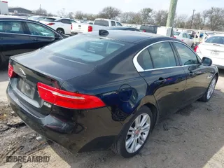 2019 Jaguar XE 25t with VIN SAJAS4FX6KCP52413, listed as a IAAI auction lot 41590240 with 68,574 mi miles. Bid and sale history available at carsss.com. Image 4.