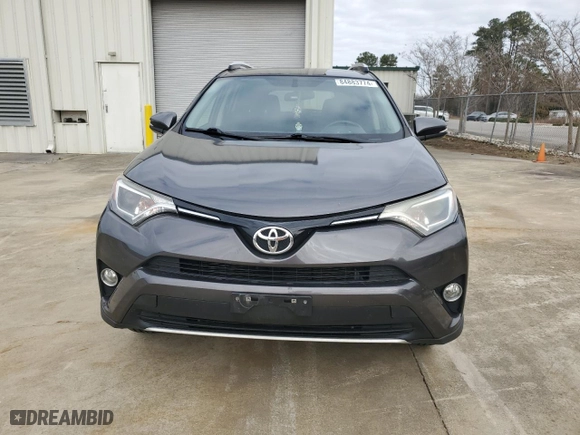 2016 Toyota RAV4 XLE with VIN JTMRFREV0GJ060556, listed as a Copart auction lot 84883774 with 85,486 mi miles and Salvage Title. Bid and sale history available at carsss.com. Image 5.