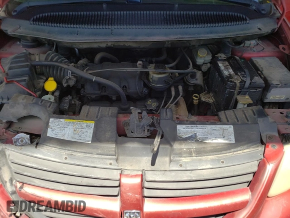 2005 Dodge Caravan SXT with VIN 2D4GP44L65R120861, listed as a Copart auction lot 57040565 with 244,971 mi miles and Salvage title. Bid and sale history available at DreamBid. Image 12.
