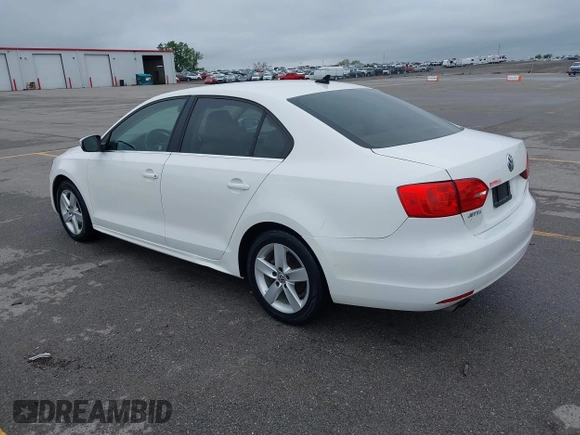 2014 Volkswagen Jetta TDI w/Premium with VIN 3VWLL7AJXEM372547, listed as a IAAI auction lot 42320105 with 113,200 mi miles and . Bid and sale history available at DreamBid. Image 3.