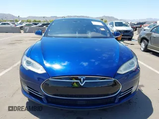 2016 Tesla Model S 70 kWh Battery with VIN 5YJSA1E10GF126433, listed as a IAAI auction lot 42169558 with 120,182 mi miles and . Bid and sale history available at carsss.com. Image 12.