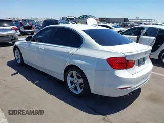 2015 BMW 3 Series 328i with VIN WBA3C1C52FK117753, listed as a IAAI auction lot 42270013 with 147,386 mi miles and . Bid and sale history available at DreamBid. Image 3.