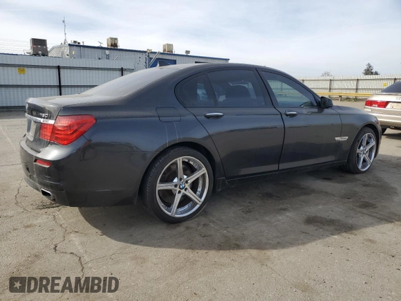 2012 BMW 7 Series 750i with VIN WBAKA8C58CDS99694, listed as a Copart auction lot 46828435 with 131,458 mi miles and Salvage title. Bid and sale history available at DreamBid. Image 3.