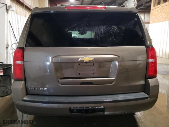 2016 Chevrolet Tahoe LT with VIN 1GNSKBKC3GR289829, listed as a Copart auction lot 49575485 with 100,697 mi miles and Salvage Title. Bid and sale history available at carsss.com. Image 6.