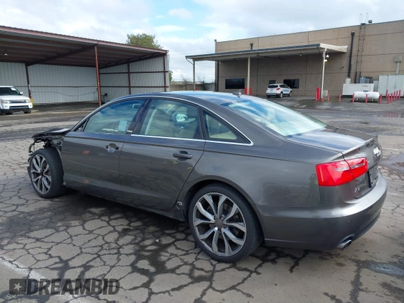 2013 Audi A6 Premium Plus z VIN WAUGGAFC8DN077982, wystawiony jako IAAI lot #41783832 z przebiegiem 95 981 mil mil oraz . Historia ofert i sprzedaży dostępna na DreamBid. Obrazek 15.