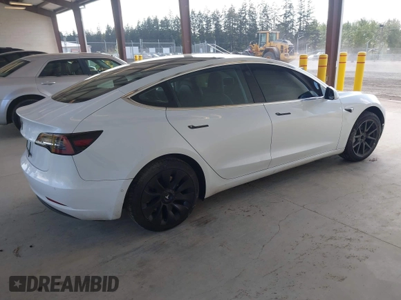 2018 Tesla Model 3 Long Range Battery z VIN 5YJ3E1EA1JF053895, wystawiony jako IAAI lot #42182178 z przebiegiem 75 356 mil mil oraz . Historia ofert i sprzedaży dostępna na DreamBid. Obrazek 4.