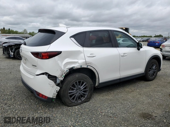 2020 Mazda CX-5 Touring with VIN JM3KFACM0L0857278, listed as a Copart auction lot 51980825 with 73,411 mi miles and Salvage Title. Bid and sale history available at carsss.com. Image 3.