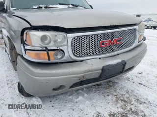 2001 GMC Yukon Denali z VIN 1GKEK63U21J222783, wystawiony jako IAAI lot #41443565 z przebiegiem Nie podano mil oraz . Historia ofert i sprzedaży dostępna na DreamBid. Obrazek 6.