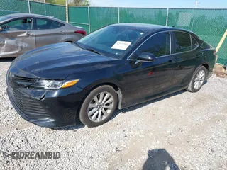 2019 Toyota Camry LE with VIN 4T1B11HK1KU718374, listed as a IAAI auction lot 42071905 with 86,460 mi miles and . Bid and sale history available at DreamBid. Image 17.
