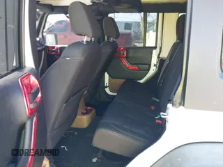 2016 Jeep Wrangler Unlimited Rubicon Hard Rock with VIN 1C4HJWFG9GL296782, listed as a IAAI auction lot 41595273 with 113,338 mi miles. Bid and sale history available at carsss.com. Image 8.