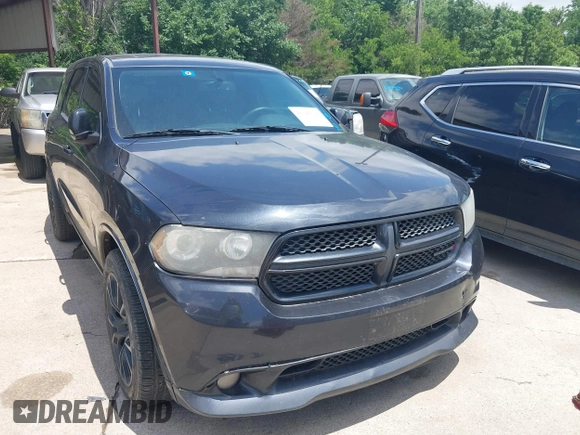 2012 Dodge Durango R/T with VIN 1C4SDJCT4CC337959, listed as a IAAI auction lot 42344317 with 187,429 mi miles and . Bid and sale history available at DreamBid. Image 6.