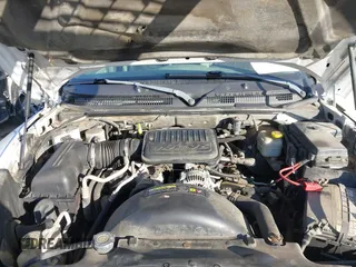 2005 Dodge Dakota SLT with VIN 1D7HE42KX5S251037, listed as a IAAI auction lot 41334761 with 202,865 mi miles and . Bid and sale history available at carsss.com. Image 10.