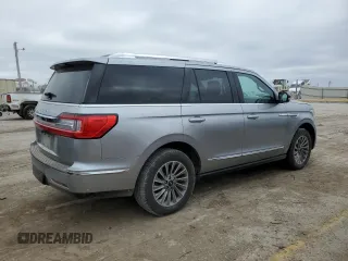 2020 Lincoln Navigator with VIN 5LMJJ2NT0LEL09760, listed as a Copart auction lot 86628254 with 118,733 mi miles and Salvage title. Bid and sale history available at DreamBid. Image 3.