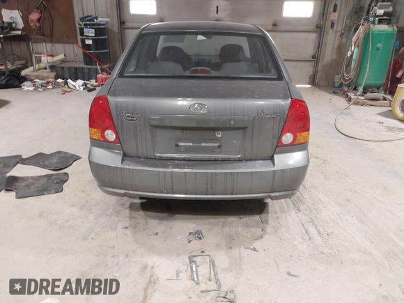 2004 Hyundai Accent GL with VIN KMHCG45C44U528783, listed as a IAAI auction lot 41535104 with 1 mi miles. Bid and sale history available at carsss.com. Image 16.