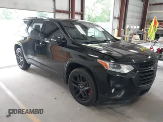 2018 Chevrolet Traverse Premier with VIN 1GNEVJKW6JJ214380, listed as a IAAI auction lot 42582859 with 148,321 mi miles and . Bid and sale history available at DreamBid. Image 1.