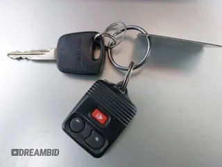 1999 Ford Expedition XLT z VIN 1FMPU18L3XLB21018, wystawiony jako IAAI lot #42003908 z przebiegiem Nie podano mil oraz . Historia ofert i sprzedaży dostępna na DreamBid. Obrazek 11.