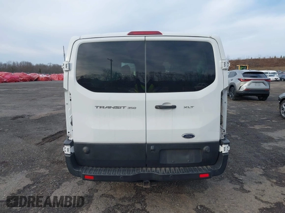 2019 Ford Transit Passenger XL z VIN 1FBZX2ZM2KKB63281, wystawiony jako IAAI lot #41859263 z przebiegiem 39 294 mil mil oraz . Historia ofert i sprzedaży dostępna na DreamBid. Obrazek 16.