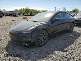 2022 Tesla Model 3 Long Range z VIN 5YJ3E1EB7NF177197, wystawiony jako Copart lot #54602135 z przebiegiem 31 656 mil mil oraz Szkoda całkowita • Salvage title. Historia ofert i sprzedaży dostępna na DreamBid. Obrazek 1.