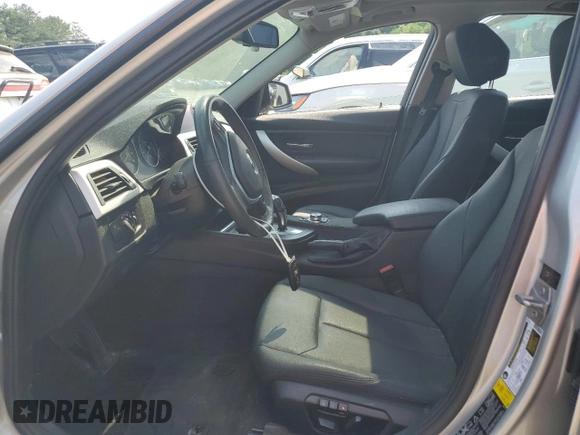 2013 BMW 3 Series 328i xDrive with VIN WBA3B5G56DNS00182, listed as a Copart auction lot 61920285 with Not provided miles and Salvage title. Bid and sale history available at DreamBid. Image 7.