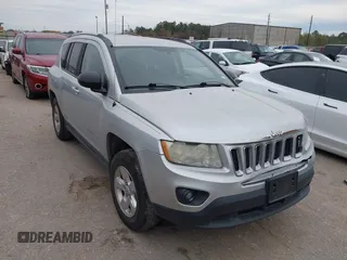 2013 Jeep Compass Sport with VIN 1C4NJCBA7DD100332, listed as a IAAI auction lot 41278779 with 161,668 mi miles. Bid and sale history available at carsss.com. Image 1.