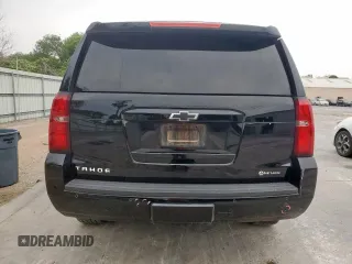 2020 Chevrolet Tahoe LT with VIN 1GNSCBKC5LR203301, listed as a Copart auction lot 57071315 with 106,376 mi miles and Salvage title. Bid and sale history available at DreamBid. Image 6.