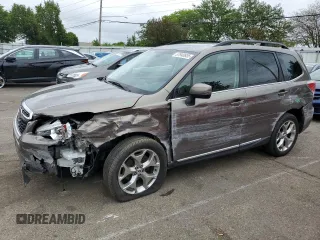 2018 Subaru Forester Touring with VIN JF2SJAWC9JH570189, listed as a Copart auction lot 57940935 with 76,574 mi miles and Salvage title. Bid and sale history available at DreamBid. Image 1.