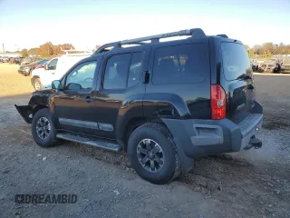 2014 Nissan Xterra X with VIN 5N1AN0NW9EN812437, listed as a Copart auction lot 83905504 with 118,805 mi miles and Salvage Title. Bid and sale history available at DreamBid. Image 2.
