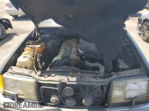 1990 Mercedes-Benz 300 CE с VIN WDBEA51D2LB091135, выставлен на аукционе Copart как лот 60143854 с пробегом 181 343 миль миль и Чистый • Clean title. История ставок и продаж доступна на DreamBid. Изображение 11.
