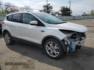 2015 Ford Escape Titanium with VIN 1FMCU0J99FUA16290, listed as a Copart auction lot 52496855 with 107,674 mi miles and Salvage Title. Bid and sale history available at DreamBid. Image 4.