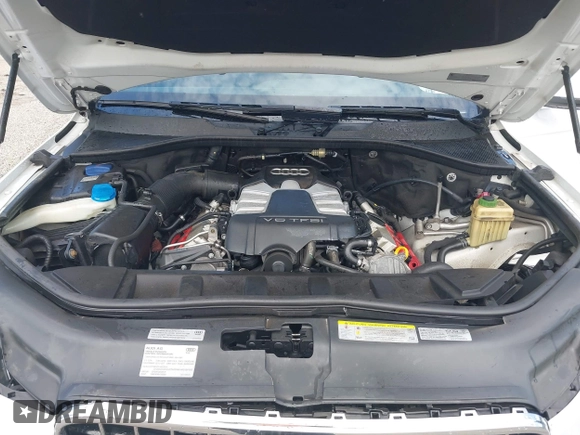 2014 Audi Q7 Premium Plus with VIN WA1LGAFE6ED015856, listed as a IAAI auction lot 42612500 with 96,946 mi miles and . Bid and sale history available at DreamBid. Image 10.