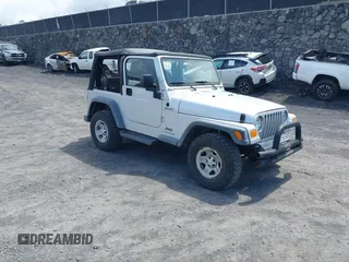 2004 Jeep Wrangler Sport with VIN 1J4FA49S04P781581, listed as a IAAI auction lot 42078693 with 111,123 mi miles and . Bid and sale history available at DreamBid. Image 1.