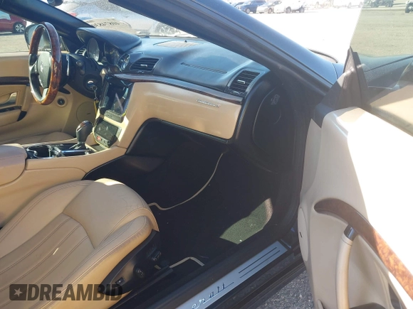 2013 Maserati GranTurismo Convertible Sport with VIN ZAM45MMA2D0069786, listed as a IAAI auction lot 40874830 with 37,312 mi miles. Bid and sale history available at carsss.com. Image 5.