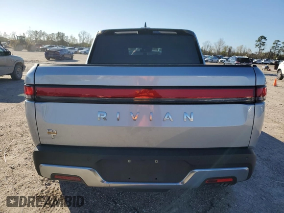 2023 Rivian R1T Adventure with VIN 7FCTGAAA3PN020577, listed as a Copart auction lot 84847414 with 7,888 mi miles and Salvage Title. Bid and sale history available at carsss.com. Image 6.