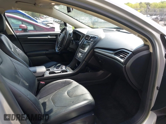 2017 Ford Fusion Titanium with VIN 3FA6P0K90HR266556, listed as a IAAI auction lot 41947924 with 135,628 mi miles. Bid and sale history available at carsss.com. Image 5.