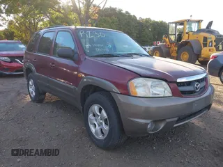 2003 Mazda Tribute ES with VIN 4F2CZ96183KM35719, listed as a IAAI auction lot 40611399 with 136,374 mi miles. Bid and sale history available at carsss.com. Image 1.