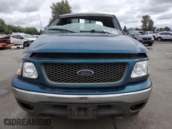 2001 Ford F-150 XL z VIN 1FTRX18W61NA24177, wystawiony jako Copart lot #60149714 z przebiegiem 192 297 mil mil oraz Szkoda całkowita • Salvage title. Historia ofert i sprzedaży dostępna na DreamBid. Obrazek 5.