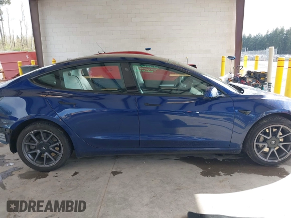2022 Tesla Model 3 Long Range with VIN 5YJ3E1EB3NF267365, listed as a IAAI auction lot 41996594 with 32,687 mi miles and . Bid and sale history available at DreamBid. Image 14.