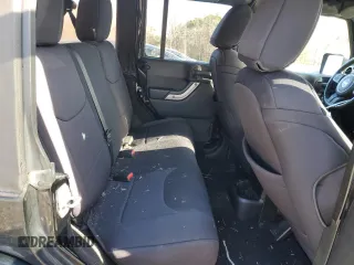 2015 Jeep Wrangler Unlimited Sahara with VIN 1C4BJWEG3FL530114, listed as a Copart auction lot 88851565 with 156,669 mi miles and Salvage Title. Bid and sale history available at carsss.com. Image 11.