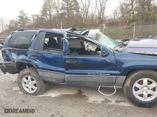 2002 Jeep Grand Cherokee Laredo with VIN 1J4GW48S82C321712, listed as a IAAI auction lot 41855809 with 1 mi miles. Bid and sale history available at carsss.com. Image 19.