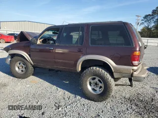 2000 Ford Explorer Eddie Bauer z VIN 1FMDU84P0YZB89831, wystawiony jako Copart lot #77874224 z przebiegiem 209 532 mil mil oraz Szkoda całkowita • Salvage title. Historia ofert i sprzedaży dostępna na DreamBid. Obrazek 2.